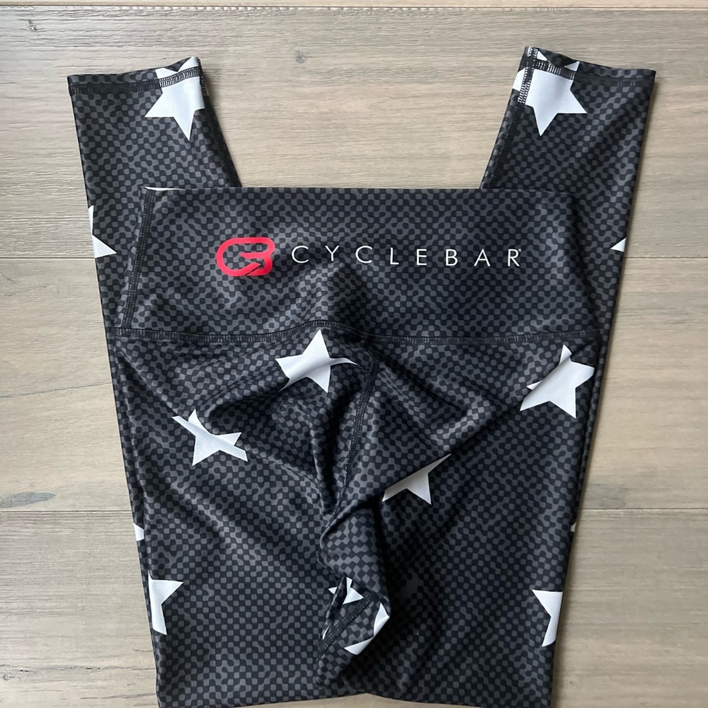 Cyclebar Black Leggings with White Stars and Red Logo